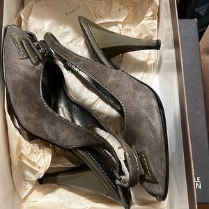 Gray suede sling back shoes.